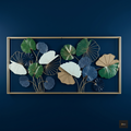 Decorative wall art with leaf patterns in a gold frame on a dark blue background