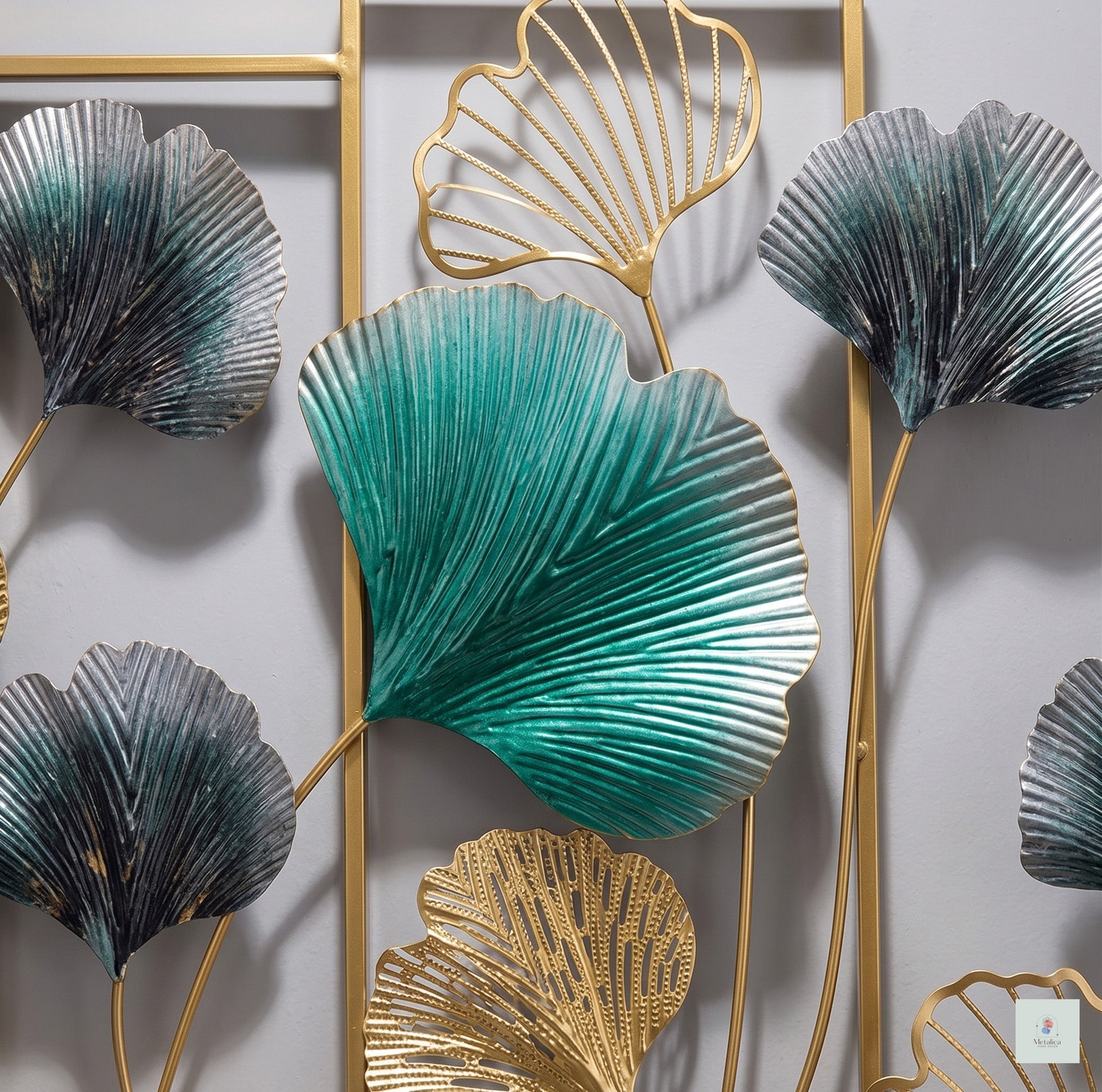 25x50 large modern metal ginkgo leaf wall art, botanical sculpture with teal and gold leaves for living room decor.