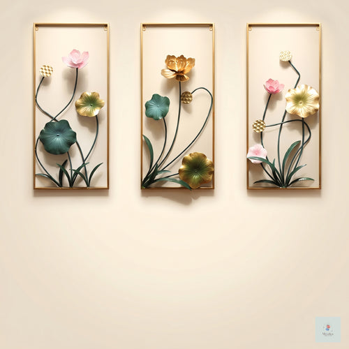 3-piece metal lotus wall art set, 33x18 inch modern vertical floral sculpture in gold, green, and pink for living room wall decor.