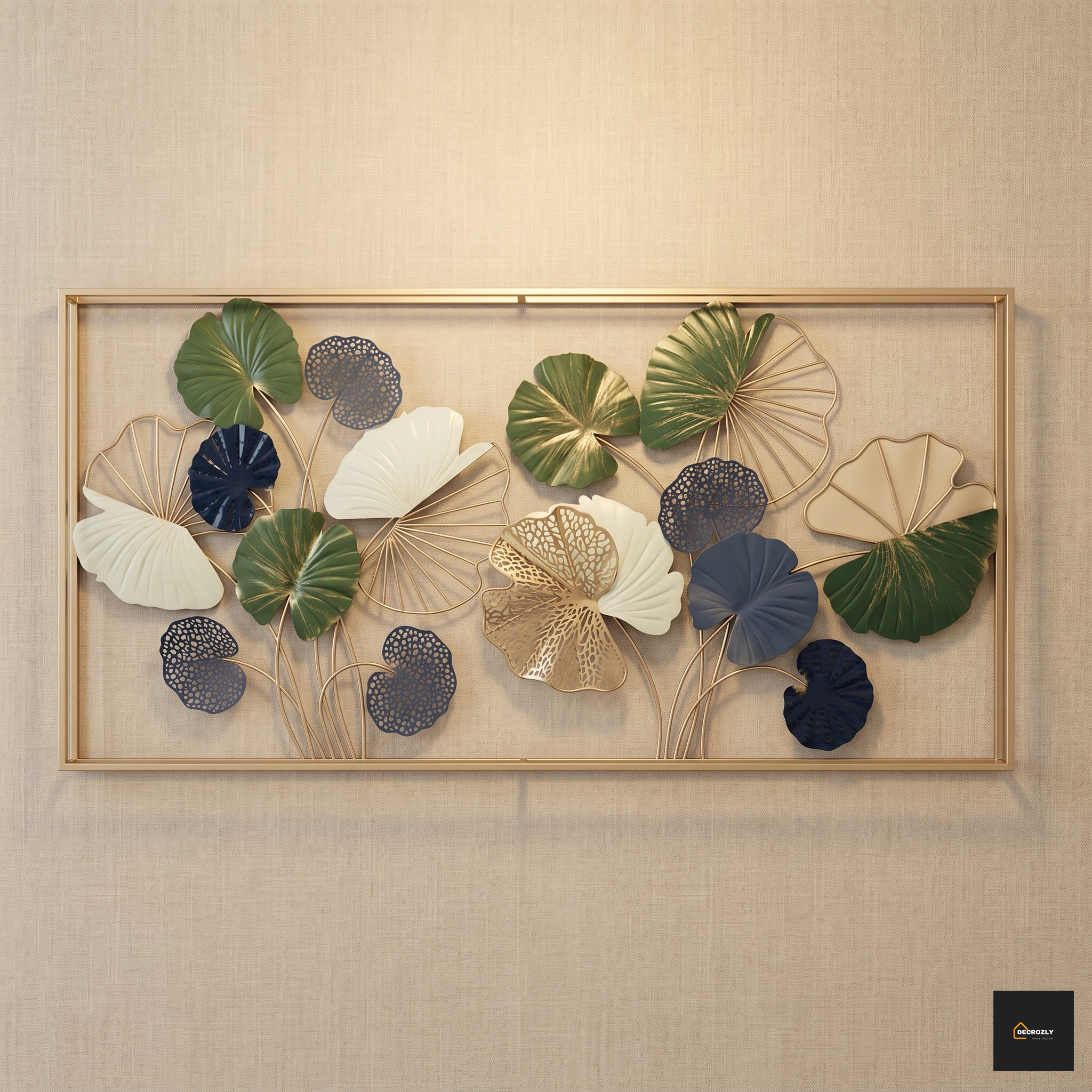 Decorative wall art with leaf patterns in a gold frame on a beige wall.