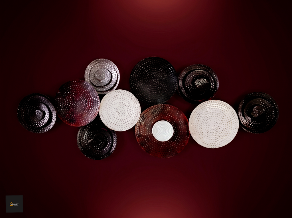 Decorative plates of various sizes and colors on a dark red background