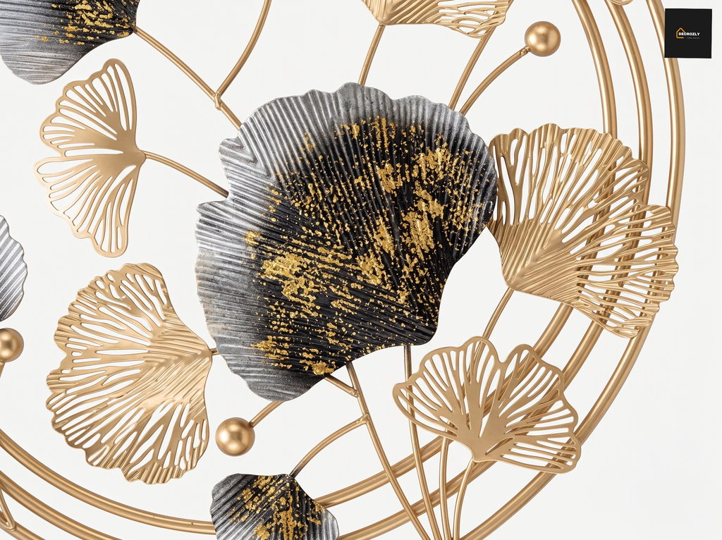 Decorative wall art with gold and black leaf patterns on a white background
